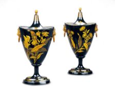 A Pair of Black and Gold Chestnut Urns Low countries circa 1790,  of traditional schooner form,