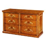 A Pollard Oak Chest of Drawers England circa 1860, mounted with foliate brass handles and  B ramah