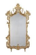 A Rococo Giltwood Pier Mirror Germany circa 1760, in the English manner, the sides and cresting