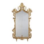 A Rococo Giltwood Pier Mirror Germany circa 1760, in the English manner, the sides and cresting