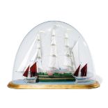 A Glass Model of A Ship in A Dome England circa 1880, made out of green, white and clear thin