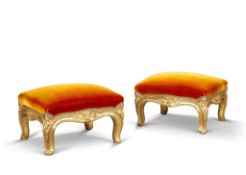 A Pair of William IV Giltwood Footstools England circa 1830, carved with foliate motif, standing