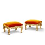 A Pair of William IV Giltwood Footstools England circa 1830, carved with foliate motif, standing