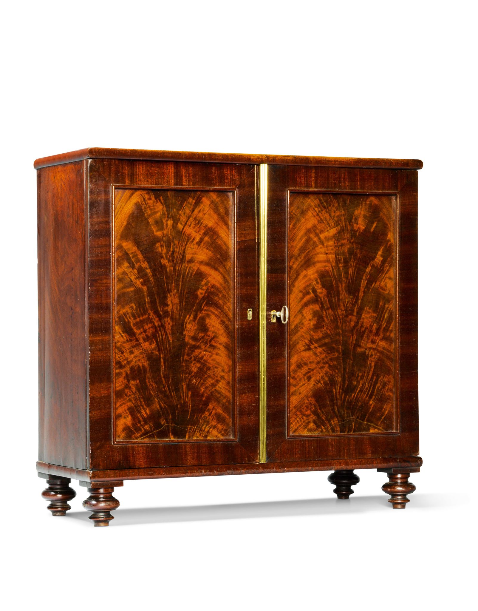 A Regency Miniature Mahogany Cabinet England circa 1810,  the flame veneered mahogany doors with - Image 2 of 2