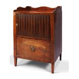 A Sheraton Mahogany Bedside Commode England circa 1780, the top having a shaped rail on three