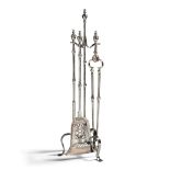 A Set of Polished Steel Fire Tools with Stand England circa 1800,  each engraved with neo-