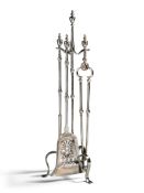 A Set of Polished Steel Fire Tools with Stand England circa 1800,  each engraved with neo-