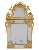 A Fine Regence Giltwood Pier Mirror France circa 1730, the cresting is enriched with carved scrolls,