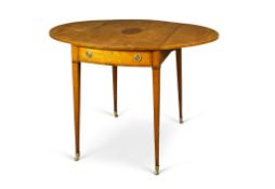 A Satinwood Pembroke Table England circa 1790, with exceptional figuring and a central oval inlay,