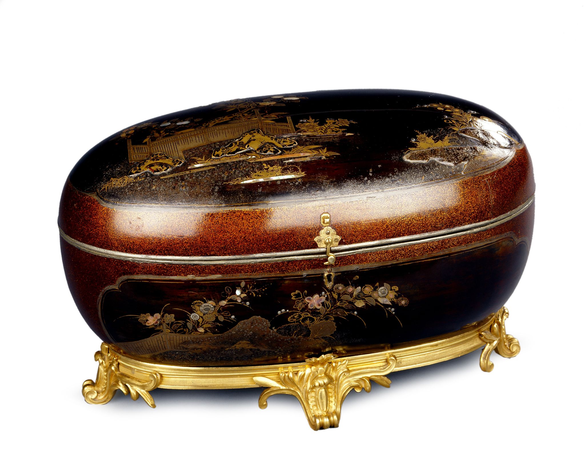A Japanese Oval Lacquer Casket Japan circa 1690,  with domed top, decorated on all sides with panels