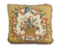 A Louis XVI Needlework Cushion France circa 1770, a superb Louis XVI needlework cushion, the central