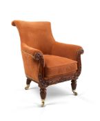 A William IV Library Chair England circa 1830, the boldly scrolled back is supported by padded