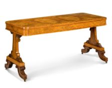 A William IV Amboyna Writing Table England circa 1830, in the manner of George Bullock, the highly