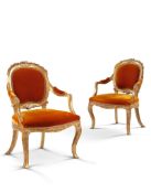 A Pair of Giltwood Armchairs Italy circa 1760, in the English taste with shaped backs enriched