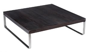 A black lacquer square coffee table, 1970s, on flat nickel plated steel supports, 35cm high, 120cm