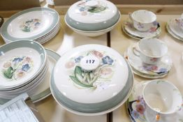A Susie Cooper part dinner service, green border and floral decorated, to include dinner plates,