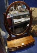 A 19th century mahogany toilet mirror, 57cm high x 38cm wide