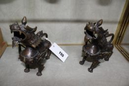 A pair of Oriental bronze dragon locks, 14cm long approx. Best Bid