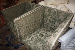 A pair of early 20th century square back armchairs in green damask chenille upholstery.