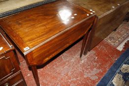A Regency mahogany and crossbanded pembroke table with a frieze drawer 82cm wide