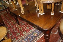 A Victorian mahogany dining table, with an additional leaf 163cm extended