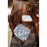 A pair of George III elm dining chairs and two others, and a pair of ladder-back chairs, also with a