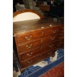 An oak chest of drawers.80cm wide x 46cm deep x 89cm high.