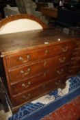 An oak chest of drawers.80cm wide x 46cm deep x 89cm high.