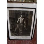 A modern framed photograph of two men, 58cm x 40cm and a modern poster -2