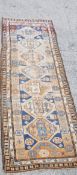 An antique Caucasian runner 276 x 97cm