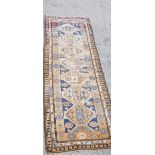 An antique Caucasian runner 276 x 97cm