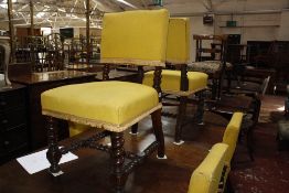 A set of six 19th century dining chairs with yellow upholstery raise on spiral twist supports.