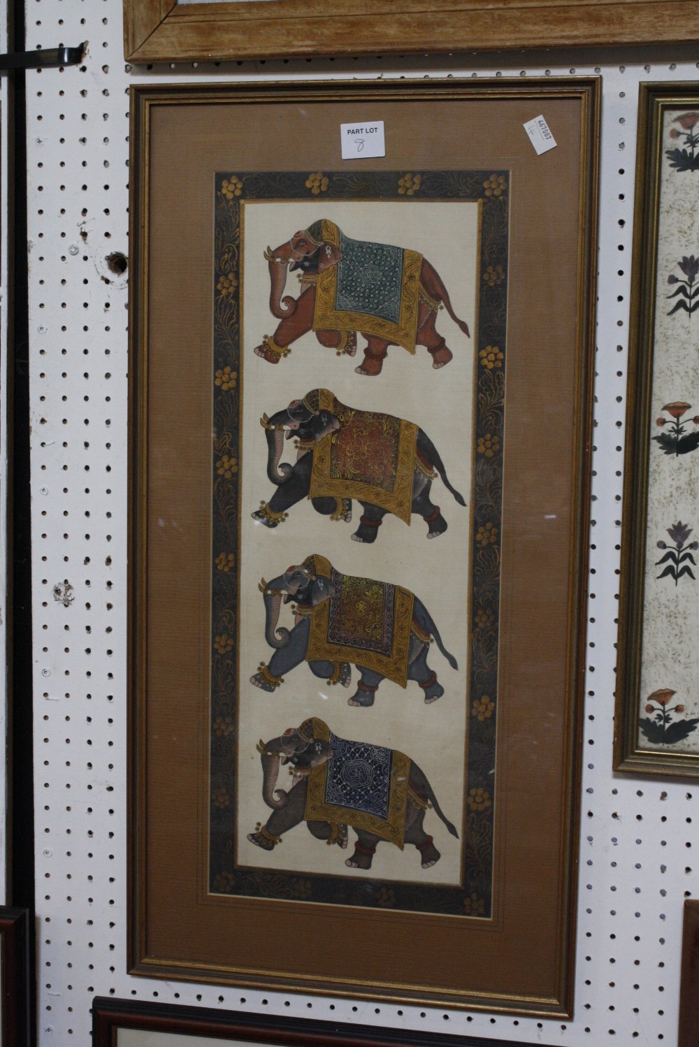 Two 20th Century Indian School paintings on silk, of elephants within foliate borders -2 - Image 2 of 2