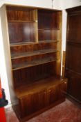 A Danish rosewood bookcase, circa 1970 in two sections, 100cm x 176cm.