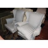Two similar 19th century style wing armchairs. Best Bid