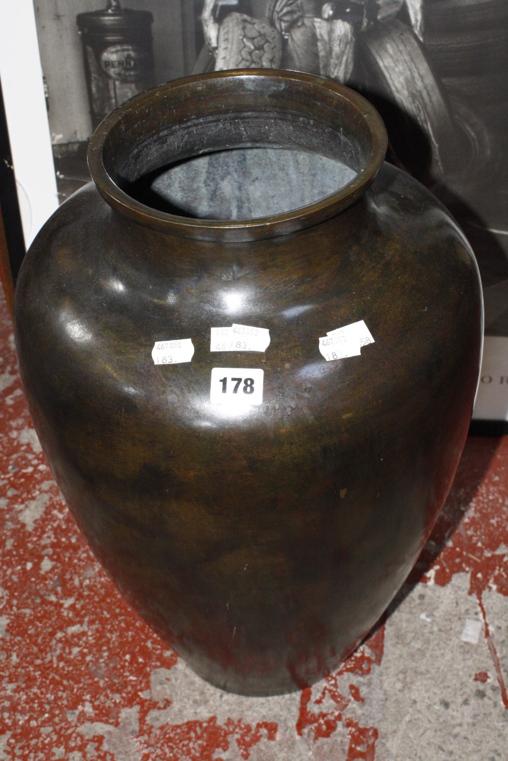 A large metal vase, baluster shaped, 51cm high