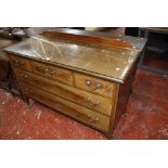 An Edwardian mahogany satinwood banded chest of drawers with glass protective cover.120cm wide x