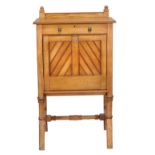 An Aesthetic ash secretaire, circa 1870, the top with moulded edge above single frieze drawer and