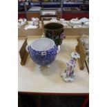 A Derby figural candle stick holder, flower encrusted (sconce broken) (AF), a blue and white two-