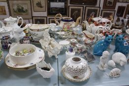 A quantity of ceramics, to include part tea services, serving dishes, jugs and vases, together