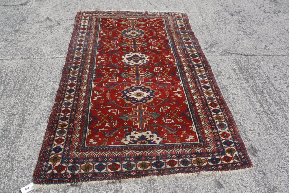 A vintage Caucasian rug 212 x 132cm