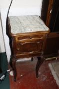 A French 19th Century style bedside table with insert marble top on cabriole supports.