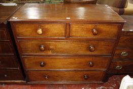 A Victorian mahogany chest of two short and three long drawers