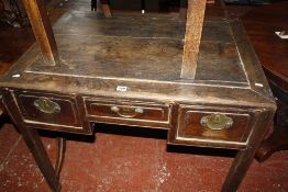 A Chinese elm side table with three drawers.97cm x 70cm