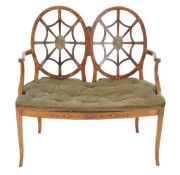 A Victorian painted beech chair back sette, circa 1890, after a design by Thomas Hepplewhite,
