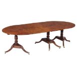 A George IV burr yew triple pillar dining table,   circa 1825, the two D ends in solid yew, the