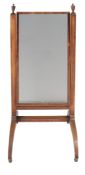A Regency mahogany cheval mirror,   circa 1810, with a central rectangular plate flanked by urn