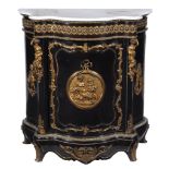 A French ebonised and gilt metal mounted side cabinet  , circa 1890, the marble top above a frieze