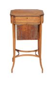 A George III satinwood and kingwood crossbanded work table,   circa 1800, the hinged top opening to