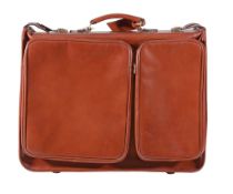 An English leather suitcase by Barrow Hepburn, 1960s, reddish brown colour, zip closing with two